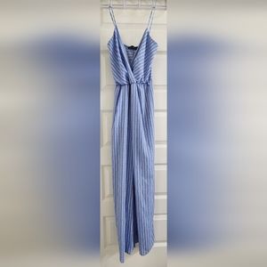 White & Baby Blue Jumpsuit. Missing tie belt.